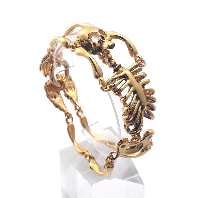 Bracelet vintage en acier inoxydable 316L avec crâne et os dominant. Titane, style audacieux pour homme, ornement résistant et intemporel.