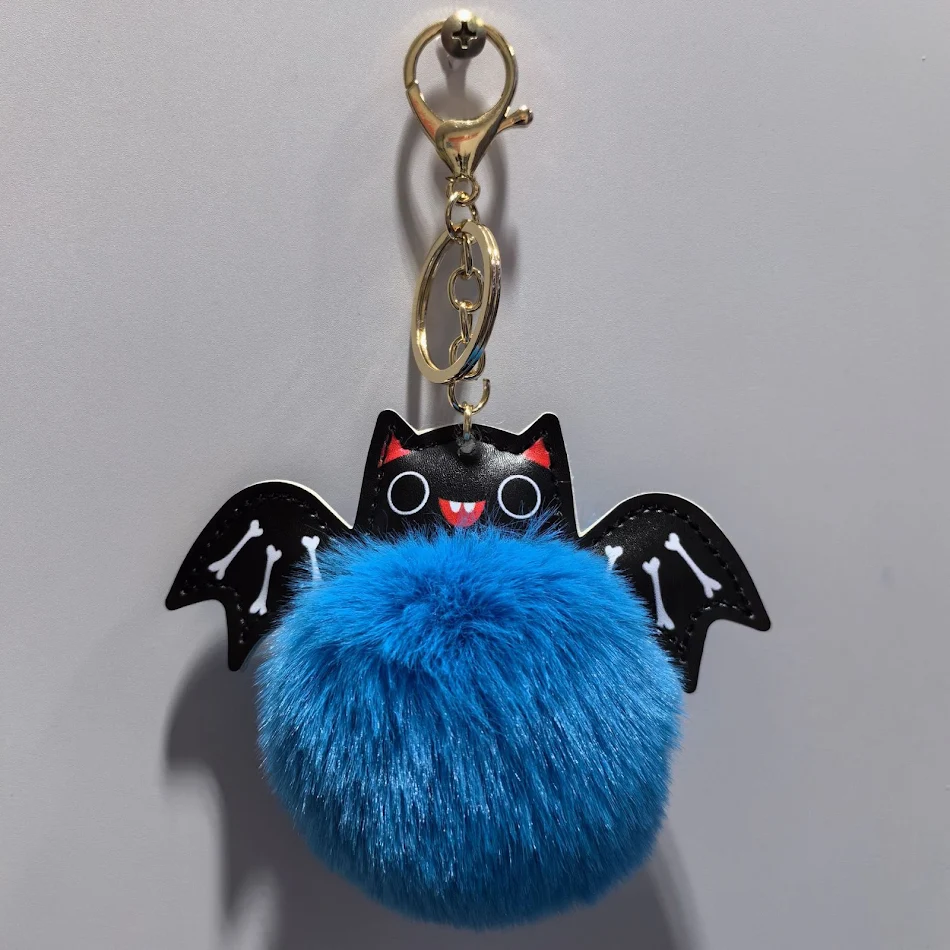 Porte-clés d'Halloween d'été en cuir avec motif de dessin animé, accessoire amusant et léger pour vos clés, cadeau idéal et original.