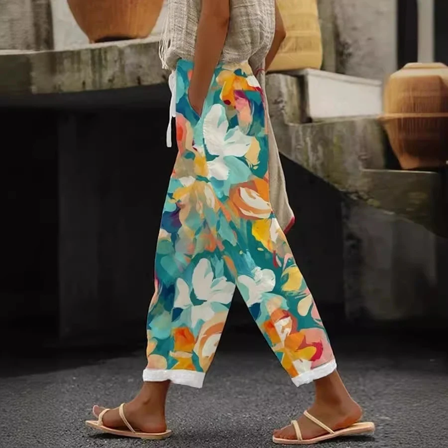 Pantaloni casual da donna con stampa floreale digitale e orecchie a brandelli, comodi ed eleganti per un look quotidiano rilassato e alla moda.