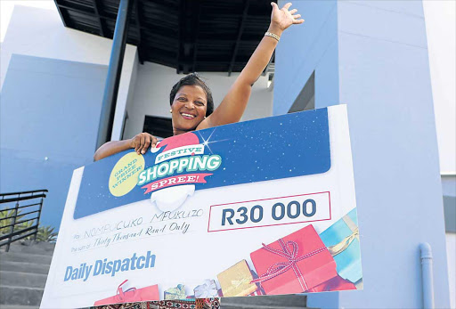 SHOP TILL YOU DROP: Nompucuko Mfukuzo, grand winner of the festive shopping spree Picture: MICHAEL PINYANA