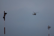 A helicopter carrying the bodies of the victims of the Tara Air passenger plane, that crashed with 22 people on board while on its way to Jomsom, arrives at the airport in Kathmandu, Nepal on May 30, 2022. 