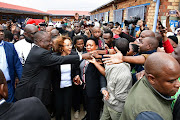 A nostalgic President Cyril Ramaphosa and his spouse, Dr Tshepo Motsepe casting their votes at Hitekani Primary School, Chiawelo, Soweto, where he grew up.  
