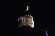 President Donald Trump attends a campaign event at Toledo Express Airport in Swanton, Ohio. 