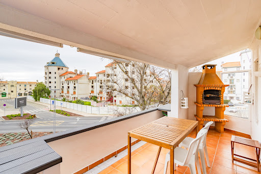 Luxury property for sale in Loulé (Portugal) - Terrace with barbecue and outdoor table city view