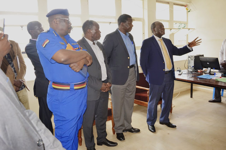 Vihiga Governor Wilber Ottichillo at the command centre with county commissioner Ochillo Oyugi, DG Patrick Saisi and police boss Hassan Barua.