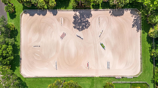 equestrian arena with jumps in this luxury house for sale in Loxahatchee Groves ($1,650,000)