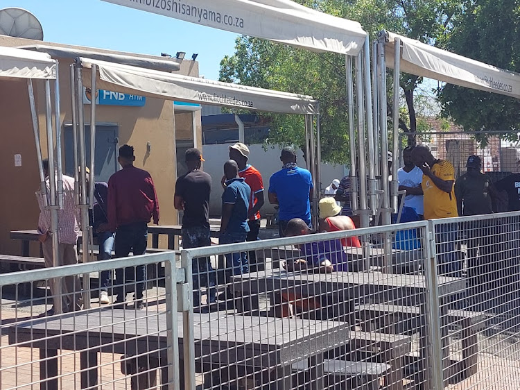 This queue at Busy Corner in Thembisa is for a bank ATM - local polling stations remain empty.