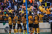 Leonardo Castro celebrates with his Kaizer Chiefs after scoring his third goal of the match.   