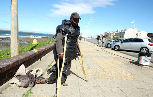 Homeless man Lennox Khwakhini at the East London Esplanade, the place he has called home for over ten years. Khwakhini is one of close to a hundred homeless people in the city who sleeps in the bushes, gutters or business doorways because of a lack of shelters. Picture: SIBONGILE NGALWA