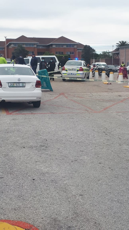 One entrance to The Bridge Shopping Centre in Greenacres was sealed by police on Monday morning after a man was shot in the parking lot.