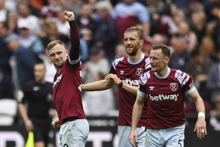 West Ham United's Jarrod Bowen celebrates scoring their second goal with Tomas Soucek and Vladimir Coufal at London Stadium in London, Britain, May 21 2023. Picture: TONY OBRIEN/REUTERS