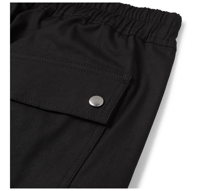 Pantaloni casual larghi con zip laterale per coppie di studenti. Tessuto sottile e confortevole per un look quotidiano.