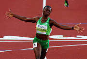 Nigeria's Tobi Amusan celebrates winning the women's 100m hurdles final.    