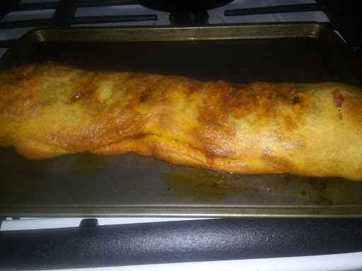 Chorizo Stromboli stuffed with pest, bacon, cheese and more!