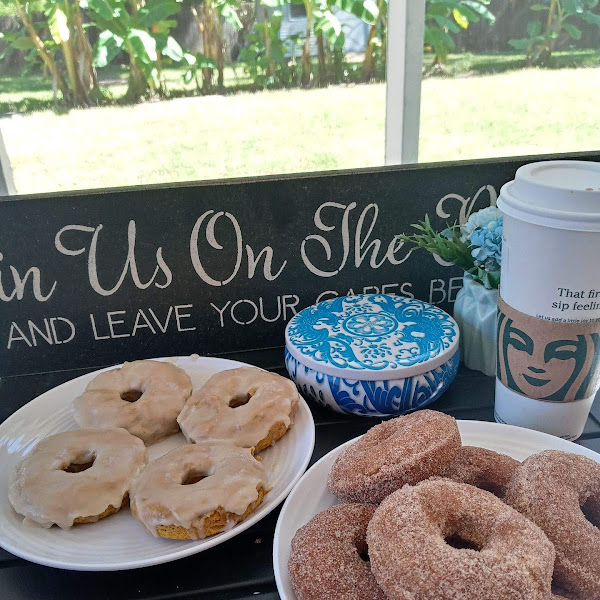 Enjoying Made with Love Donuts on the porch