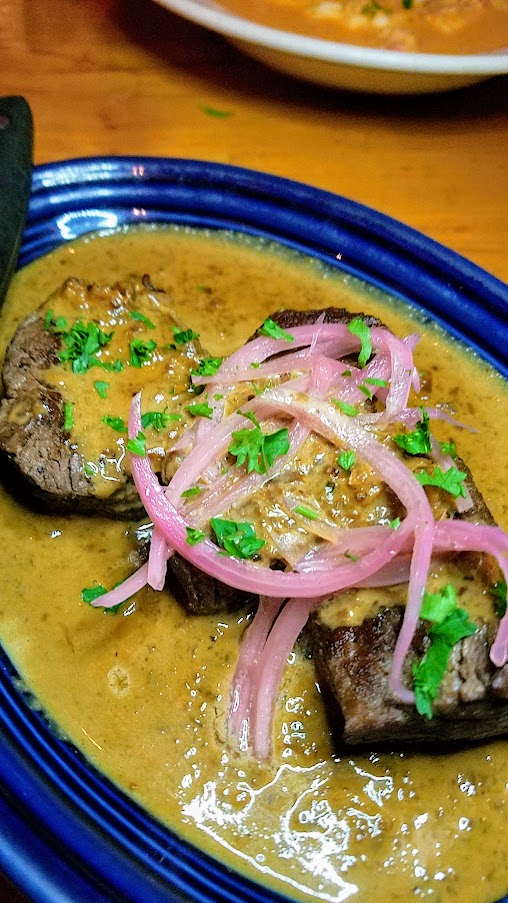 Portland Dining Month at Tapalaya PDX, course 3 of Steak Diane with beef medallions in a brandy mushroom cream sauce with pickled onions