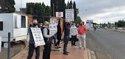 A silent protest on the go outside the Kempton Park magistrate's court.
