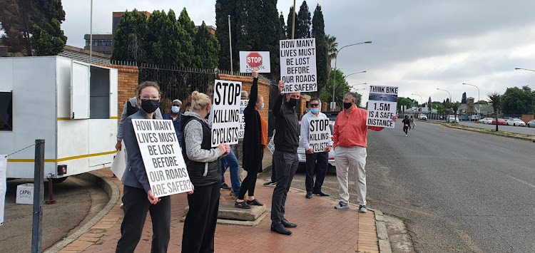 A silent protest on the go outside the Kempton Park magistrate's court.