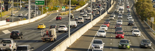 Cars close together on a busy highway