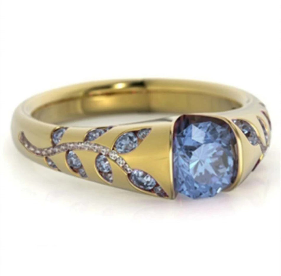Bague simple avec incrustations de feuilles multicolores, un bijou élégant pour toutes les occasions. Un accessoire essentiel.