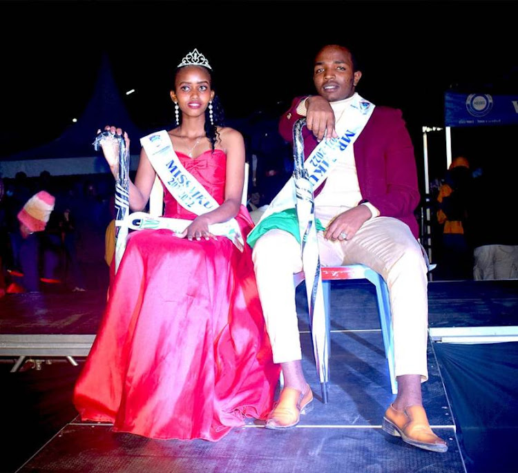 Jae Mukela Twite and Merly Sheila Awuor pose for a photo after being crowned as the 2021-2022 Mr & Miss MKU