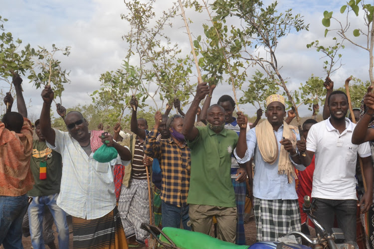 Residents of Hawewanje area in Chakama location Magarini constituency during a peaceful demonstration against the alleged massive sale of community land by few individuals.