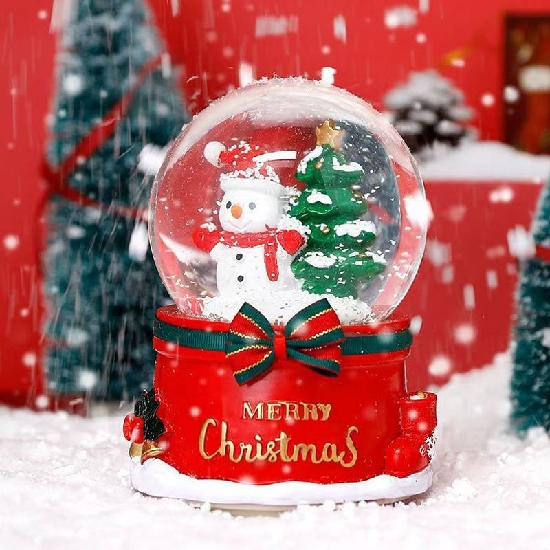 Christmas music box with glass globe and snow effect