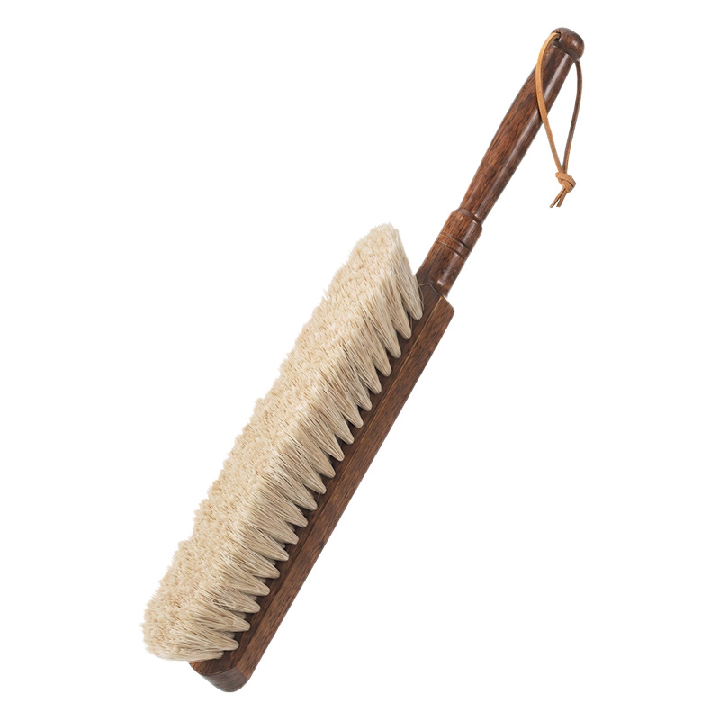 Bed brush with horse hair and long handle
