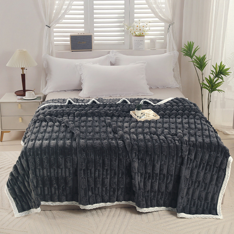 Warm plush blanket with faux fur appearance