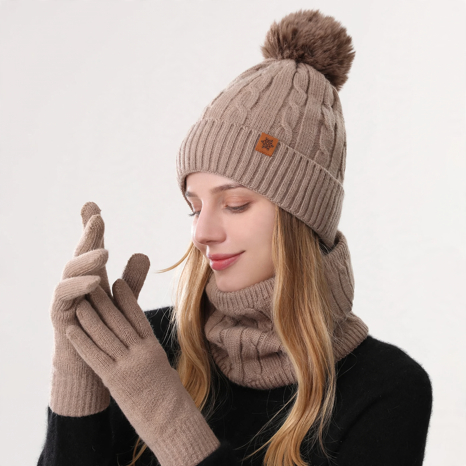 Winter set of knitted beanie, scarf, and gloves