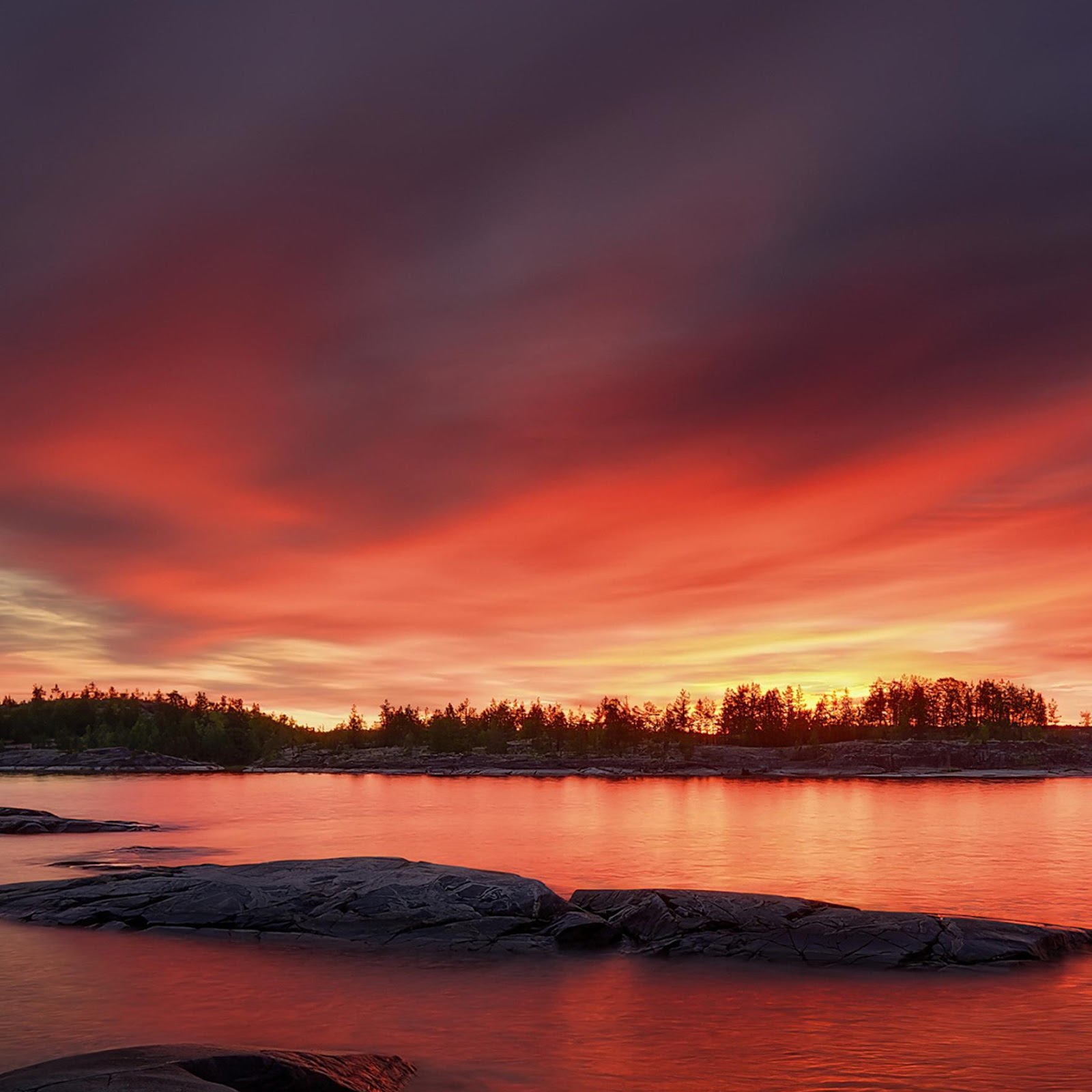 Download Fiery Sunset Over Rocky Water 2K iPhone