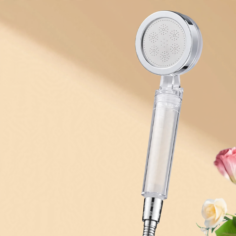 Handheld shower with filter and pressure booster