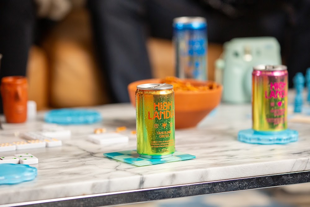 Highlandia THC drink cans lined up on a kitchen counter