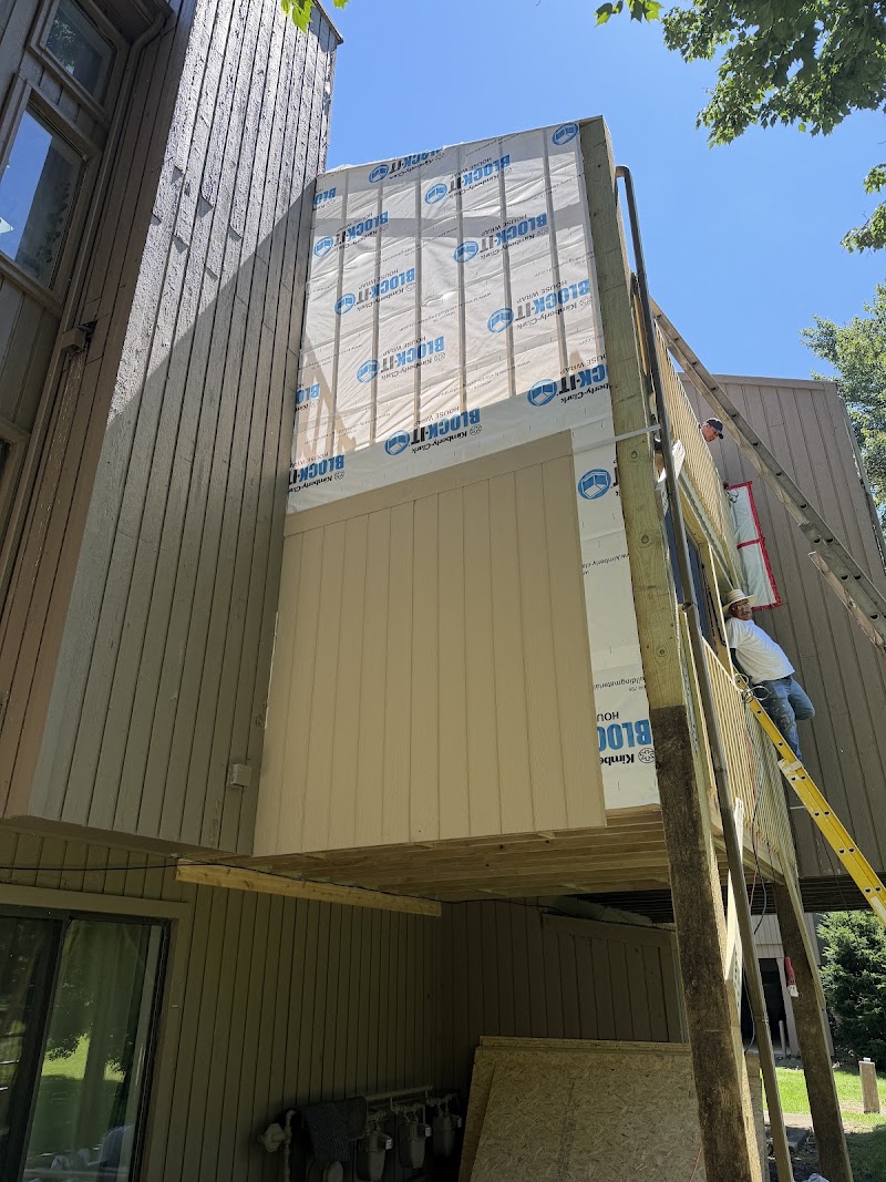 Balcony walls at The Lookout wrapped in weather barrier over new framing before siding installation