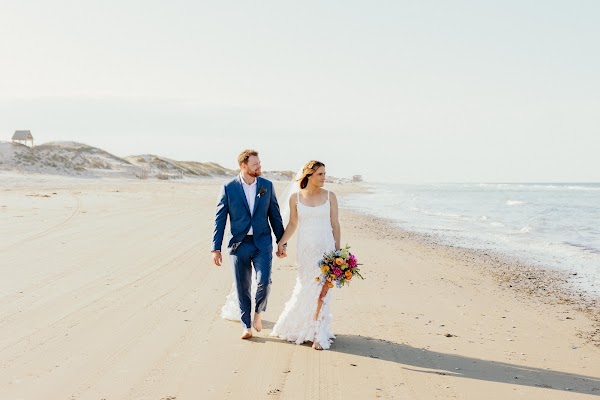 Couple walking the shoreline