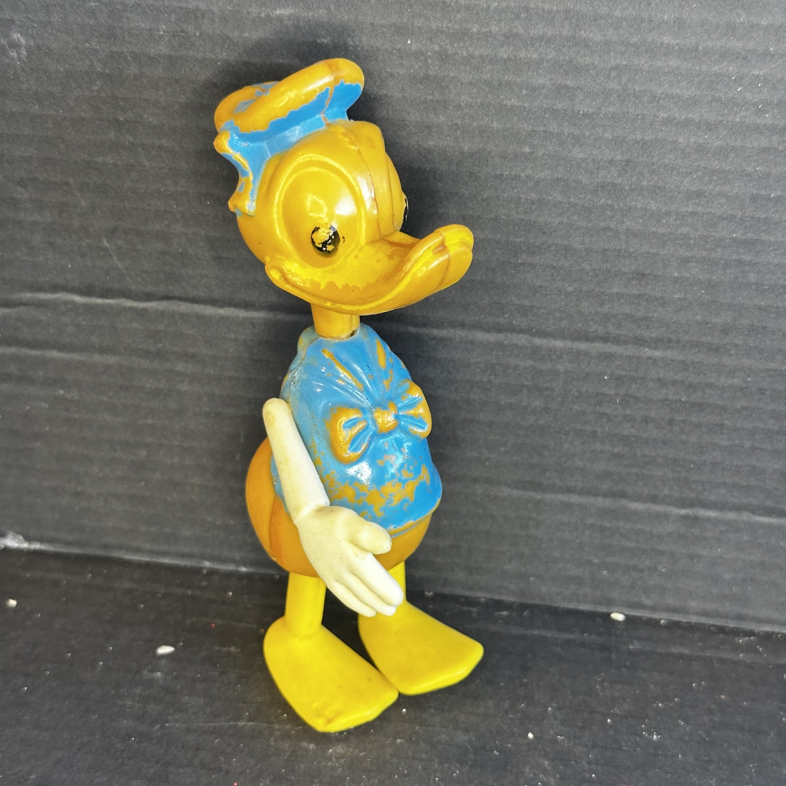 Vintage Donald Duck wind-up toy from the late 1950s to early 1960s, shown in sailor suit with original finish
