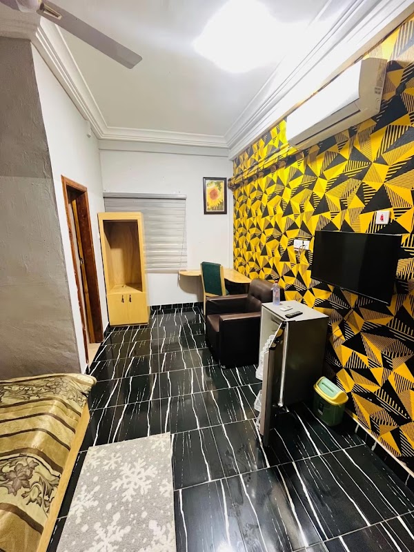 Suite bedroom at Point 3 Hotel, the best hotel in Adeiso