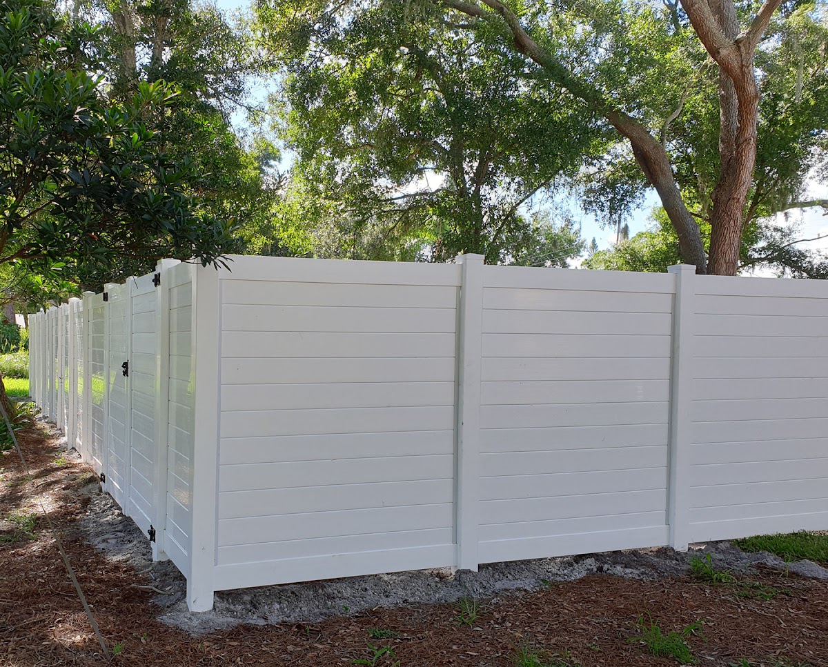 Vinyl privacy fence backyard Southwest Florida home — Premier Fence of SWFL