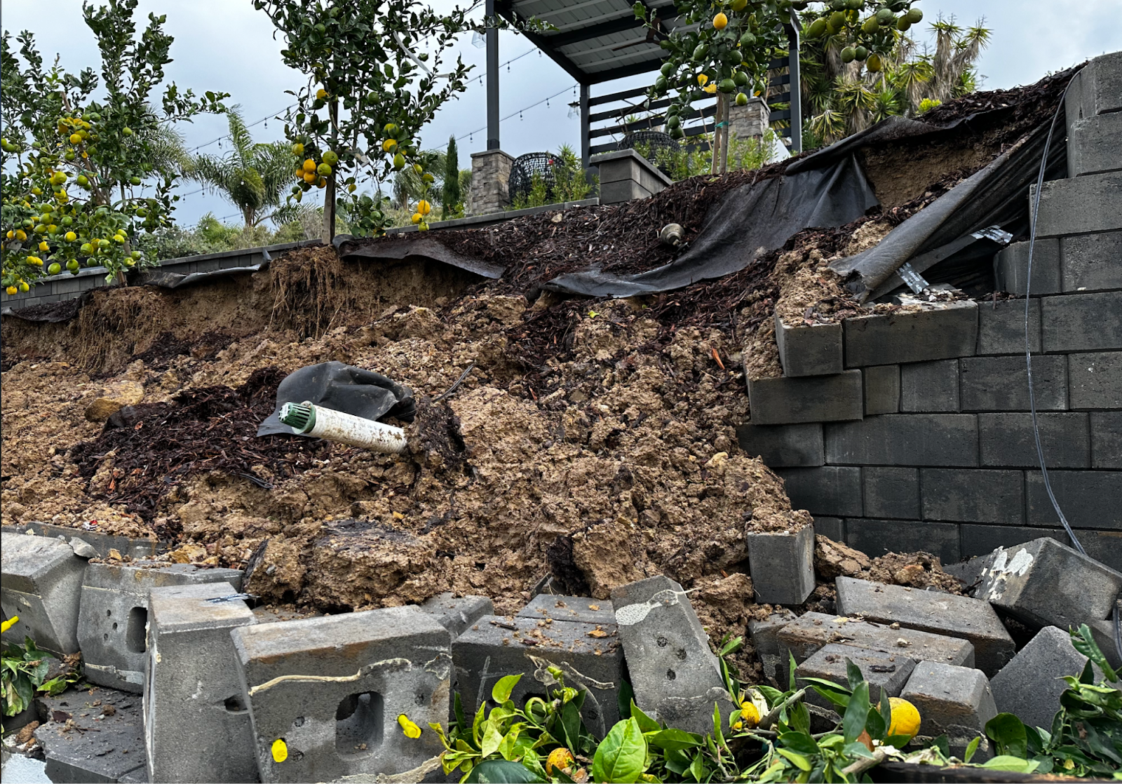 Front entry hardscape damage — Evo defective work
