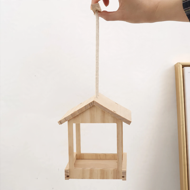Hanging wooden birdhouse with feeding station