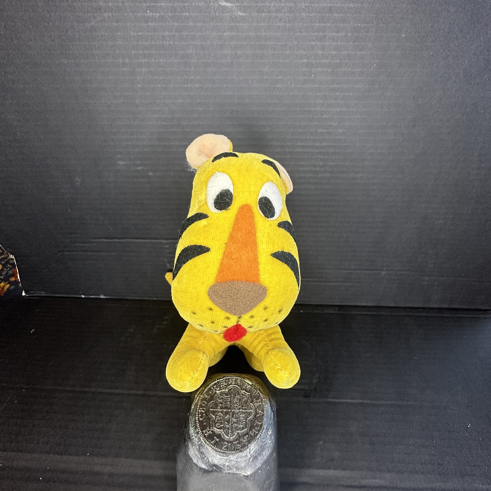 Vintage 1970s–80s Tigger stylized plush toy made from synthetic velour with plastic googly eyes, produced by Walt Disney Productions