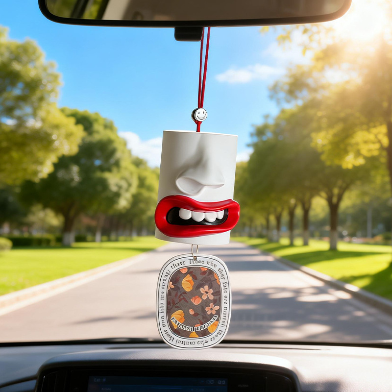 Car air freshener with abstract lip design