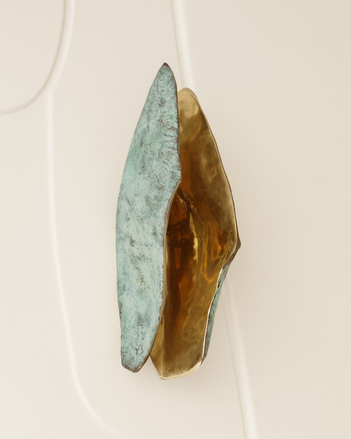 Bronze leaf sconce, verdigris