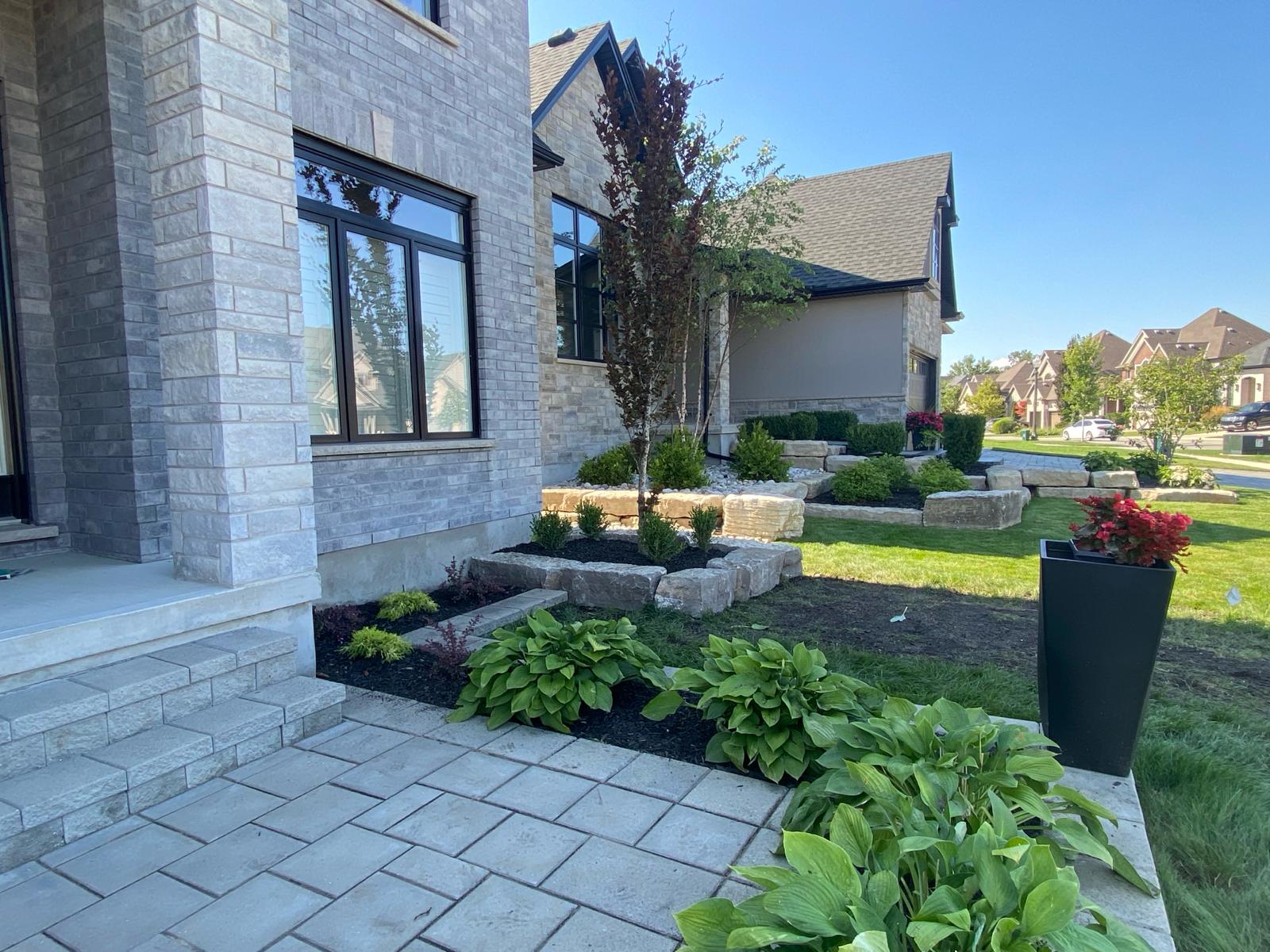 Front entrance garden bed landscaping in London, Ontario
