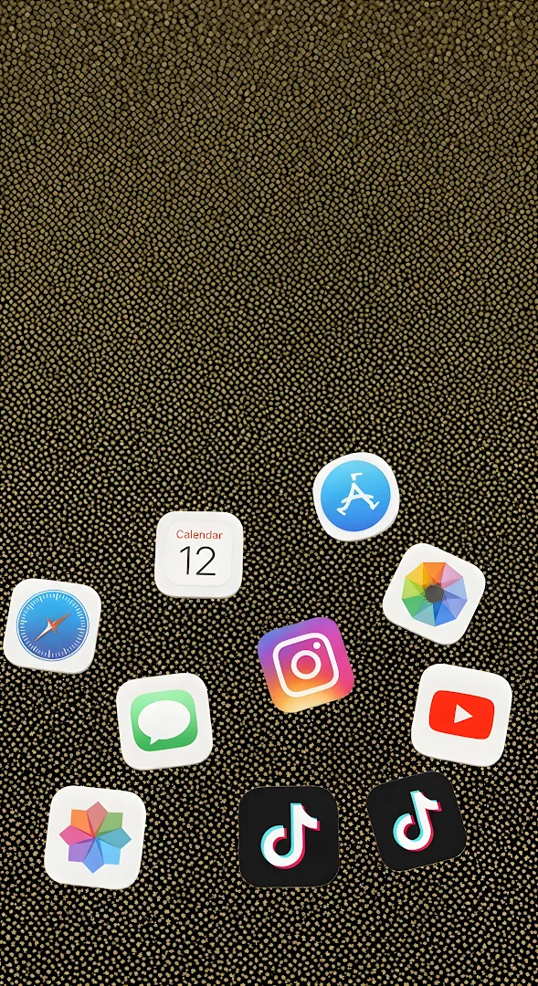 Mobile App Icons on Dark Gold Textured Background