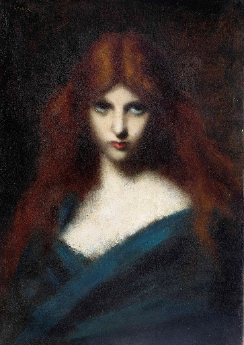 Portrait of a young girl with red hair