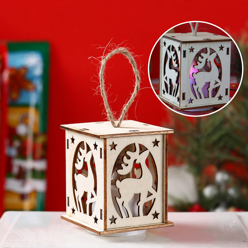 Illuminated wooden house for Christmas decoration