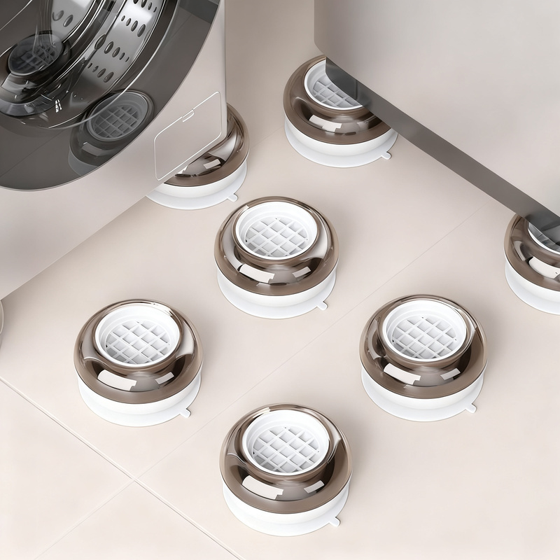 Underlays for washing machines with suction cups