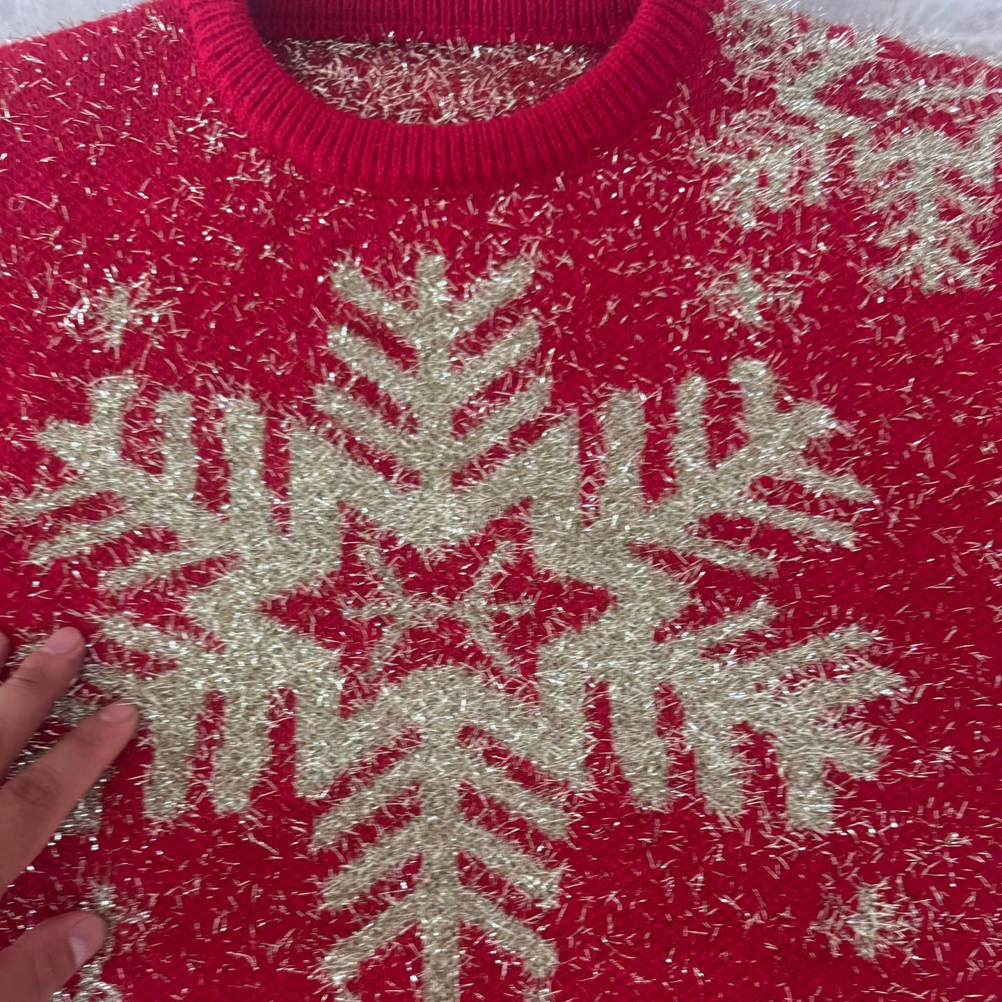 Festive women's Christmas sweater with reindeer and snowflakes