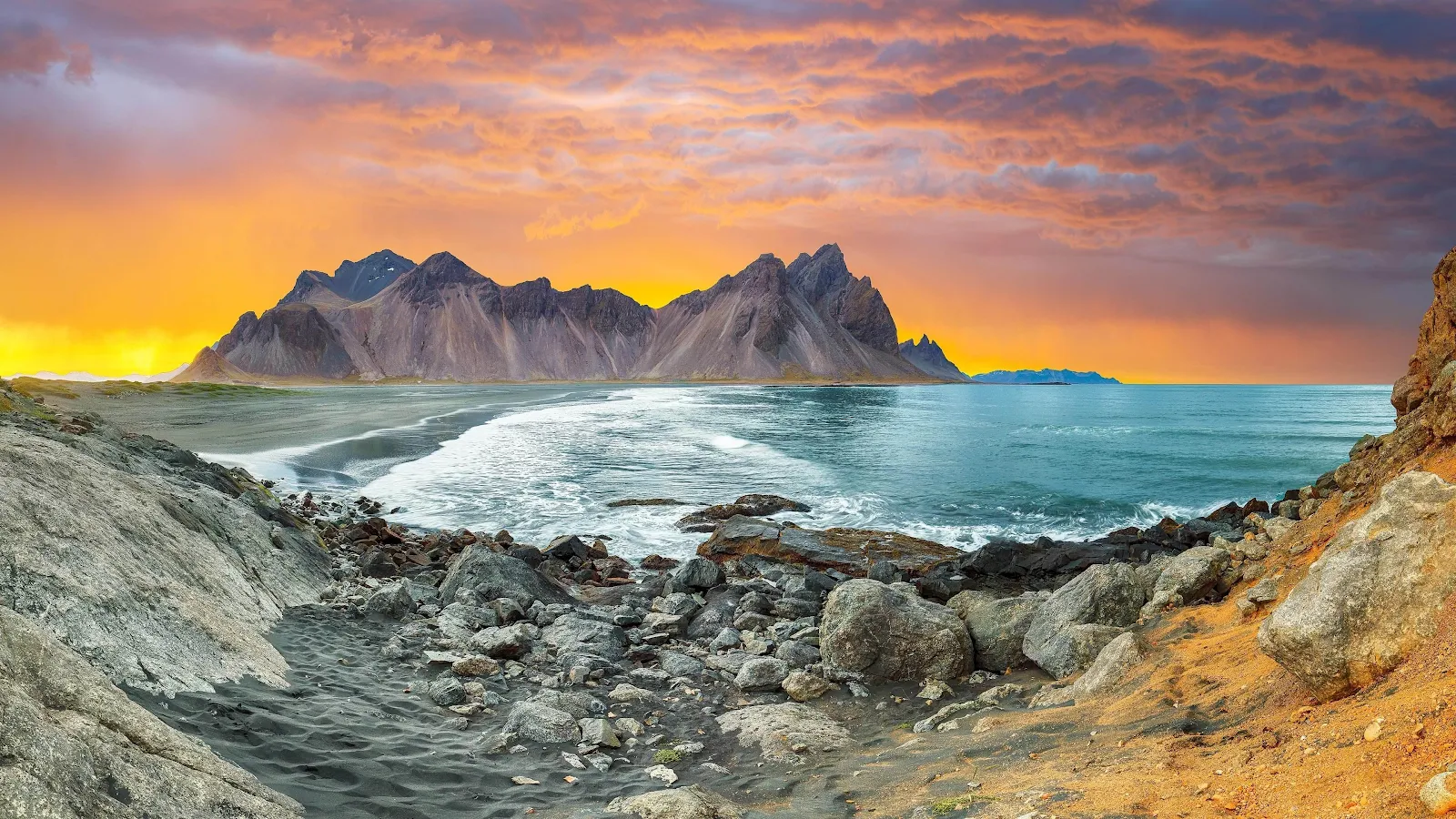 Fiery Sunset Over Rocky Beach - Landscape Photography 4K Wallpaper (3840x2160)